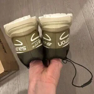 Salomon Black and Gold Sneakers